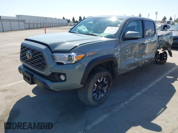 2022 Toyota Tacoma SR with VIN 3TMCZ5AN0NM489420, listed as a IAAI auction lot 42597175 with 129,340 mi miles and . Bid and sale history available at DreamBid. Image 18.