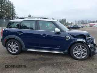 2019 MINI Countryman Cooper S z VIN WMZYT5C54K3G92704, wystawiony jako IAAI lot #41821521 z przebiegiem 95 087 mil mil oraz . Historia ofert i sprzedaży dostępna na DreamBid. Obrazek 14.
