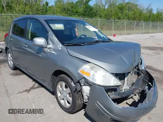 2012 Nissan Versa S with VIN 3N1BC1CP2CK279126, listed as a IAAI auction lot 42002414 with 193,567 mi miles. Bid and sale history available at carsss.com. Image 1.