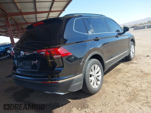 2018 Volkswagen Tiguan SEL with VIN 3VV3B7AX5JM009157, listed as a IAAI auction lot 41745746 with 138,876 mi miles and . Bid and sale history available at DreamBid. Image 4.