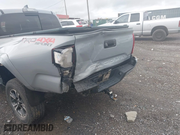 2019 Toyota Tacoma SR z VIN 3TMCZ5AN1KM206969, wystawiony jako IAAI lot #41951159 z przebiegiem 94 875 mil mil oraz . Historia ofert i sprzedaży dostępna na DreamBid. Obrazek 6.