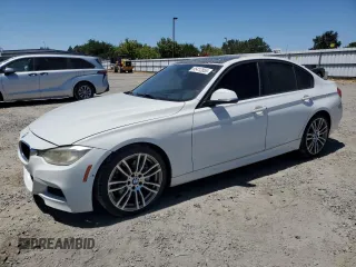 2013 BMW 3 Series 335i with VIN WBA3A9C54DF476824, listed as a Copart auction lot 65412855 with 194,724 mi miles and Clean title. Bid and sale history available at DreamBid. Image 1.