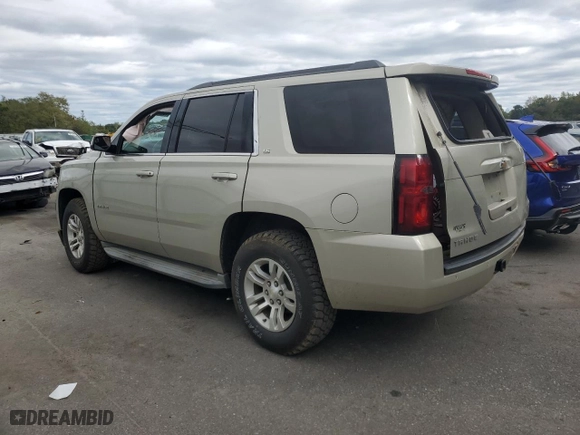 2015 Chevrolet Tahoe LS with VIN 1GNSKAKCXFR106192, listed as a Copart auction lot 73876014 with 178,406 mi miles and Salvage Title. Bid and sale history available at carsss.com. Image 2.