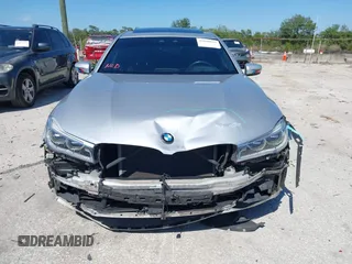2016 BMW 7 Series 750i xDrive with VIN WBA7F2C52GG417733, listed as a IAAI auction lot 42040625 with 91,007 mi miles. Bid and sale history available at carsss.com. Image 13.