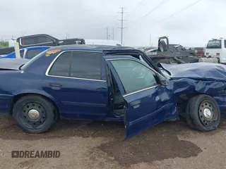 2010 Ford Police Interceptor z VIN 2FABP7BV8AX117615, wystawiony jako IAAI lot #42204261 z przebiegiem Nie podano mil oraz . Historia ofert i sprzedaży dostępna na DreamBid. Obrazek 12.