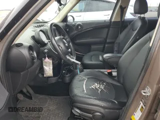 2013 MINI Countryman z VIN WMWZB3C53DWM31457, wystawiony jako Copart lot #55528885 z przebiegiem 137 279 mil mil oraz Szkoda całkowita • Salvage title. Historia ofert i sprzedaży dostępna na DreamBid. Obrazek 7.