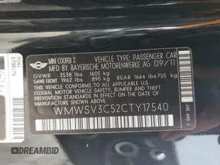 2012 MINI Hardtop S with VIN WMWSV3C52CTY17540, listed as a Copart auction lot 64137185 with 115,542 mi miles and Salvage title. Bid and sale history available at DreamBid. Image 12.