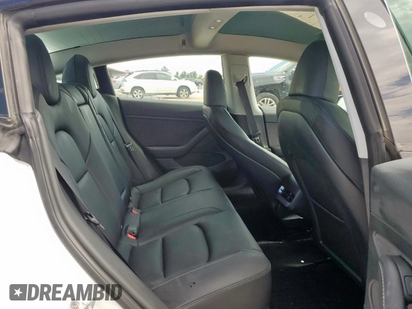 2023 Tesla Model 3 with VIN 5YJ3E1EA1PF550454, listed as a Copart auction lot 58985695 with 19,199 mi miles and Salvage title. Bid and sale history available at DreamBid. Image 10.