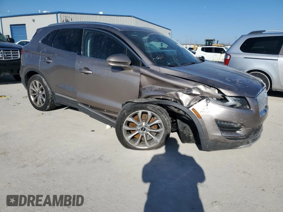 2019 Lincoln MKC Select with VIN 5LMCJ2D96KUL02511, listed as a Copart auction lot 48630875 with 83,635 mi miles and Salvage title. Bid and sale history available at DreamBid. Image 4.