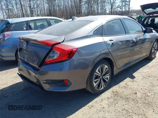 2016 Honda Civic Sedan EX-L with VIN 2HGFC1F71GH650684, listed as a IAAI auction lot 41760811 with 115,014 mi miles. Bid and sale history available at carsss.com. Image 4.
