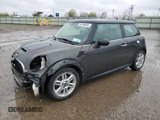 2013 MINI Hardtop S with VIN WMWSV3C50DT477984, listed as a Copart auction lot 56190855 with 98,878 mi miles and Salvage Title. Bid and sale history available at DreamBid. Image 1.