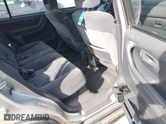 1999 Honda CR-V LX with VIN JHLRD1840XC057285, listed as a IAAI auction lot 42126071 with 99,000 mi miles. Bid and sale history available at carsss.com. Image 8.