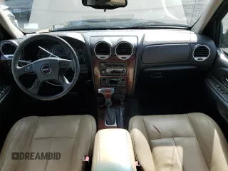 2005 GMC Envoy SLT with VIN 1GKDS13S552135280, listed as a Copart auction lot 68097344 with 165,924 mi miles and Salvage Title. Bid and sale history available at carsss.com. Image 8.