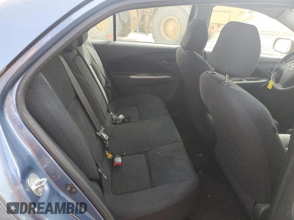 2009 Toyota Yaris z VIN JTDBT903394052663, wystawiony jako Copart lot #54700835 z przebiegiem 110 459 mil mil oraz Szkody całkowita. Historia ofert i sprzedaży dostępna na DreamBid. Obrazek 10.