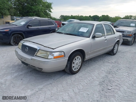 2004 Mercury Grand Marquis GS with VIN 2MEFM74W04X669087, listed as a IAAI auction lot 42090394 with 172,008 mi miles. Bid and sale history available at carsss.com. Image 2.