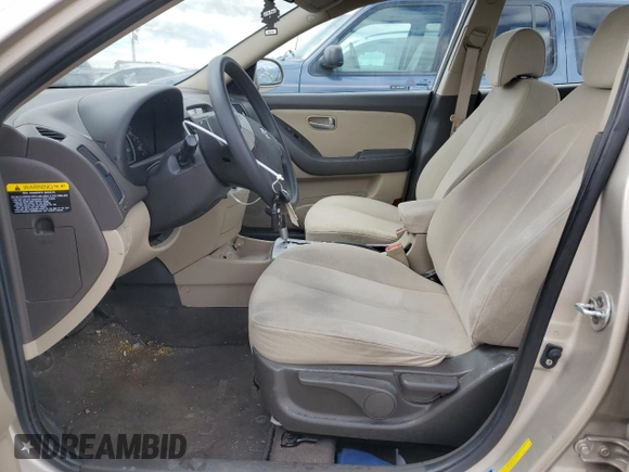 2009 Hyundai Elantra GLS with VIN KMHDU46D69U639010, listed as a Copart auction lot 57311405 with 96,759 mi miles and Salvage title. Bid and sale history available at DreamBid. Image 7.