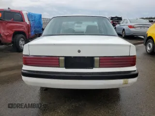 1993 Chevrolet Corsica LT z VIN 1G1LT53T4PY262289, wystawiony jako Copart lot #81687643 z przebiegiem 236 597 mil mil oraz Tytuł czysty. Historia ofert i sprzedaży dostępna na DreamBid. Obrazek 6.
