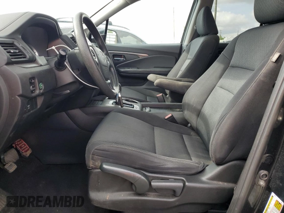 2019 Honda Ridgeline Sport with VIN 5FPYK2F15KB003142, listed as a Copart auction lot 57058235 with 173,049 mi miles and Clean title. Bid and sale history available at DreamBid. Image 7.