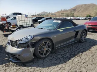 2019 Porsche 718 Boxster z VIN WP0CA2A80KS211281, wystawiony jako Copart lot #68340883 z przebiegiem 27 151 mil mil oraz . Historia ofert i sprzedaży dostępna na DreamBid. Obrazek 1.