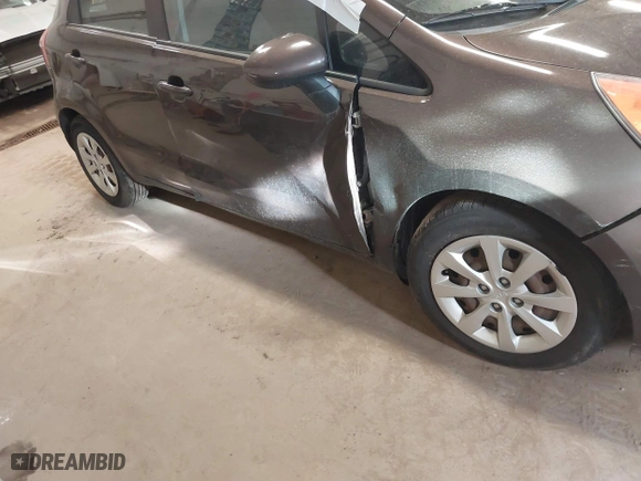 2013 Kia Rio SX with VIN KNADN5A32D6136879, listed as a IAAI auction lot 41815817 with 110,763 mi miles. Bid and sale history available at carsss.com. Image 6.