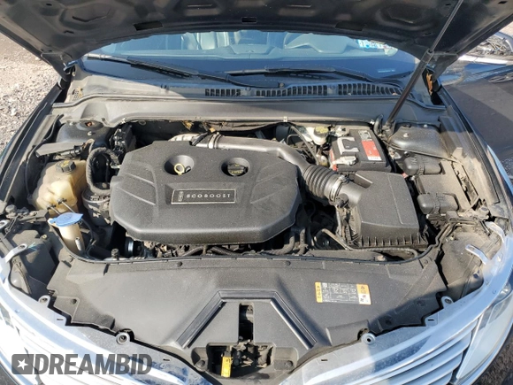 2014 Lincoln MKZ z VIN 3LN6L2J90ER802254, wystawiony jako Copart lot #58727025 z przebiegiem 172 297 mil mil oraz Szkoda całkowita • Salvage title. Historia ofert i sprzedaży dostępna na DreamBid. Obrazek 11.