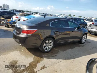 2013 Buick LaCrosse Premium 1 с VIN 1G4GF5E33DF228876, выставлен на аукционе Copart как лот 64781645 с пробегом 108 212 миль миль и Списание • Salvage title. История ставок и продаж доступна на DreamBid. Изображение 3.