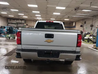 2015 Chevrolet Silverado 1500 LT with VIN 1GCVKREH5FZ271451, listed as a IAAI auction lot 42040083 with 262,135 mi miles and . Bid and sale history available at DreamBid. Image 16.
