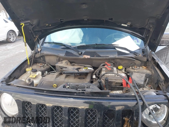 2014 Jeep Patriot Latitude with VIN 1C4NJRFBXED687701, listed as a IAAI auction lot 41399153 with 109,783 mi miles. Bid and sale history available at carsss.com. Image 10.