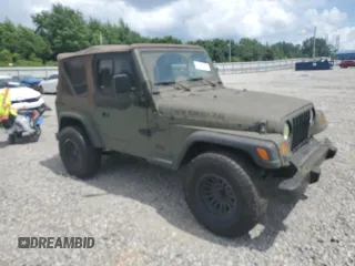1998 Jeep Wrangler SE with VIN 1J4FY29P8WP784825, listed as a Copart auction lot 61581205 with 148,152 mi miles and Clean title. Bid and sale history available at DreamBid. Image 4.