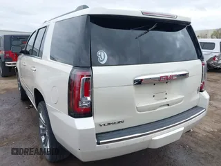 2015 GMC Yukon Denali with VIN 1GKS2CKJ7FR737165, listed as a IAAI auction lot 41914478 with 156,059 mi miles. Bid and sale history available at carsss.com. Image 16.