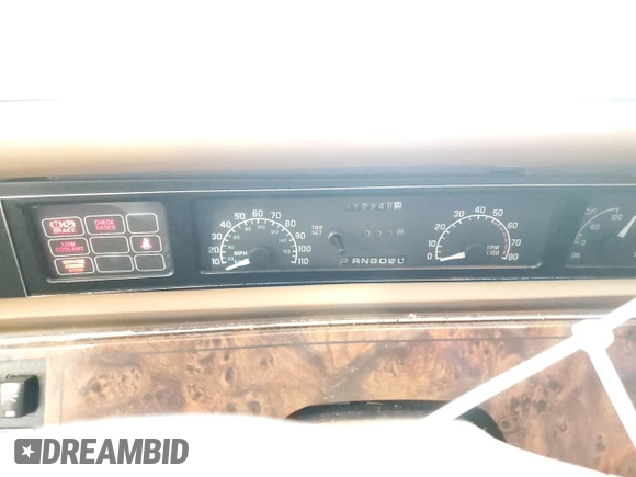 1993 Buick Regal Custom with VIN 2G4WB54L4P1411904, listed as a Copart auction lot 56564455 with 112,248 mi miles and Salvage title. Bid and sale history available at DreamBid. Image 9.
