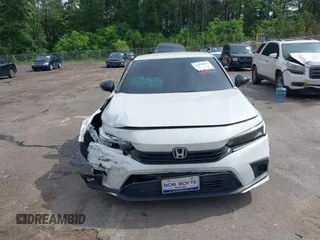 2023 Honda Civic Sport z VIN 2HGFE2F52PH551676, wystawiony jako IAAI lot #42099012 z przebiegiem 37 760 mil mil oraz . Historia ofert i sprzedaży dostępna na DreamBid. Obrazek 12.