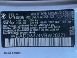 1997 BMW 5 Series 528iA with VIN WBADD6324VBW20221, listed as a Copart auction lot 82865794 with 74,647 mi miles and Clean Title. Bid and sale history available at carsss.com. Image 10.