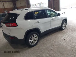 2014 Jeep Cherokee Altitude with VIN 1C4PJMCB7EW186432, listed as a IAAI auction lot 42076018 with 150,186 mi miles and . Bid and sale history available at DreamBid. Image 4.