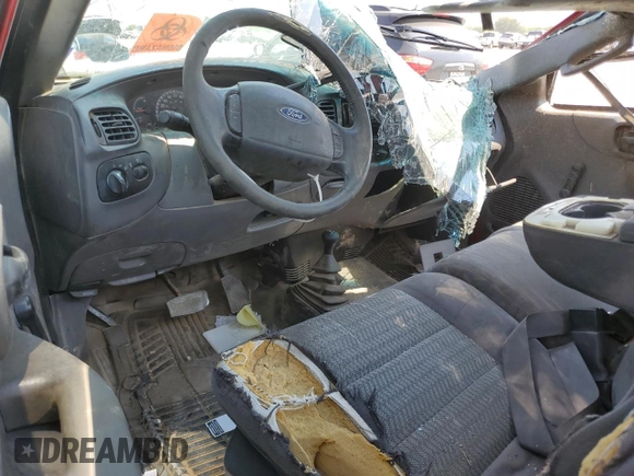 2003 Ford F-150 XL z VIN 1FTRF18223NA52111, wystawiony jako Copart lot #74816344 z przebiegiem 175 021 mil mil oraz Szkoda całkowita • Salvage title. Historia ofert i sprzedaży dostępna na DreamBid. Obrazek 8.