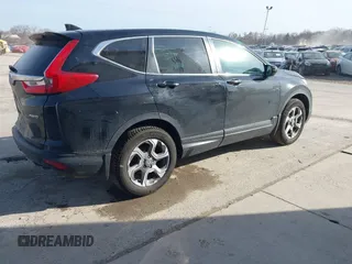2019 Honda CR-V EX with VIN 2HKRW2H58KH660245, listed as a IAAI auction lot 41773041 with 52,498 mi miles and . Bid and sale history available at DreamBid. Image 4.