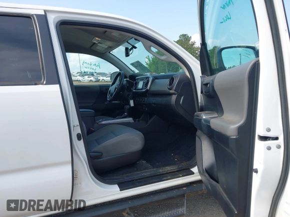 2017 Toyota Tacoma SR5 with VIN 3TMCZ5AN1HM063580, listed as a IAAI auction lot 42421660 with 95,543 mi miles and . Bid and sale history available at DreamBid. Image 5.