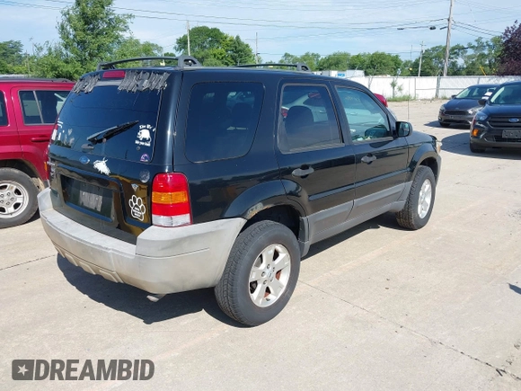 2006 Ford Escape XLT with VIN 1FMYU03176KA55498, listed as a IAAI auction lot 42499429 with 156,298 mi miles and . Bid and sale history available at DreamBid. Image 4.