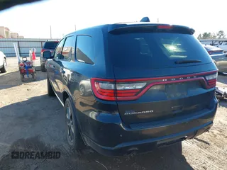 2014 Dodge Durango SXT with VIN 1C4RDHAG8EC353808, listed as a IAAI auction lot 41264850 with 196,716 mi miles and . Bid and sale history available at carsss.com. Image 3.
