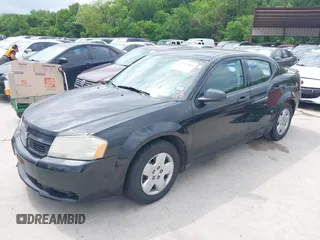 2009 Dodge Avenger SE with VIN 1B3LC46B89N502258, listed as a IAAI auction lot 42132545 with 142,305 mi miles and . Bid and sale history available at carsss.com. Image 2.