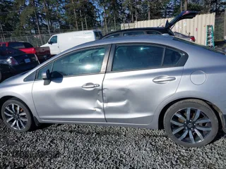 2015 Honda Civic Sedan EX-L with VIN 19XFB2F91FE205512, listed as a IAAI auction lot 41849708 with 122,947 mi miles. Bid and sale history available at carsss.com. Image 14.