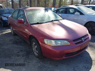 2000 Honda Accord SE z VIN JHMCG5678YC040944, wystawiony jako IAAI lot #41668087 z przebiegiem 230 246 mil mil oraz . Historia ofert i sprzedaży dostępna na DreamBid. Obrazek 1.