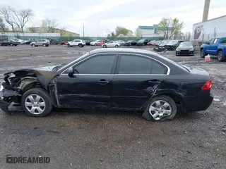 2007 Kia Optima LX with VIN KNAGE123175133499, listed as a IAAI auction lot 41958955 with 132,480 mi miles. Bid and sale history available at carsss.com. Image 15.