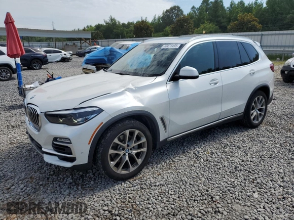 2019 BMW X5 xDrive40i with VIN 5UXCR6C5XKLK80703, listed as a Copart auction lot 63473495 with 57,260 mi miles and Salvage title. Bid and sale history available at DreamBid. Image 1.