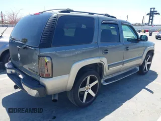 2001 Chevrolet Tahoe LT with VIN 1GNEC13T91R113281, listed as a IAAI auction lot 42081879 with 227,760 mi miles. Bid and sale history available at carsss.com. Image 4.