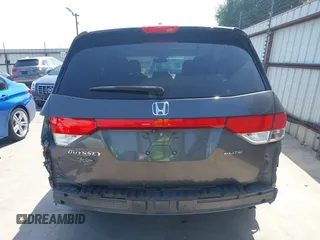 2014 Honda Odyssey Touring with VIN 5FNRL5H99EB075979, listed as a IAAI auction lot 42520154 with 99,314 mi miles and . Bid and sale history available at DreamBid. Image 17.
