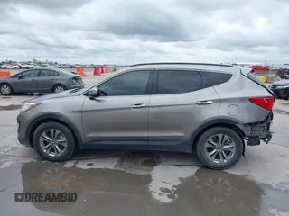 2014 Hyundai Santa Fe with VIN 5XYZU3LB2EG155127, listed as a IAAI auction lot 41864518 with Not provided miles and . Bid and sale history available at DreamBid. Image 15.
