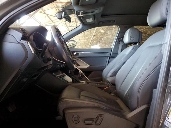 2020 Audi Q3 Premium with VIN WA1AECF34L1034797, listed as a Copart auction lot 51096385 with 74,192 mi miles and Salvage title. Bid and sale history available at DreamBid. Image 7.