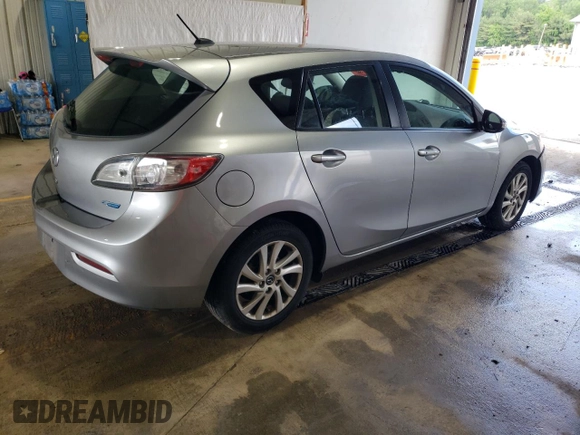 2013 Mazda 3 i Grand Touring with VIN JM1BL1MP5D1790764, listed as a Copart auction lot 57269495 with 105,604 mi miles and Salvage title. Bid and sale history available at DreamBid. Image 3.