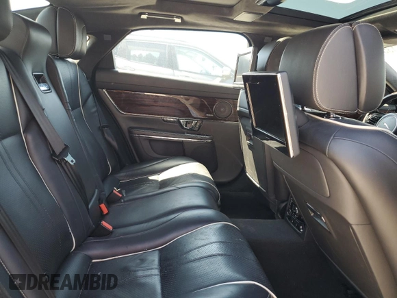 2014 Jaguar XJ Portfolio with VIN SAJWA2GZ2E8V66906, listed as a Copart auction lot 64888135 with 166,194 mi miles and Clean title. Bid and sale history available at DreamBid. Image 10.